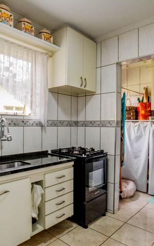Apartamento à venda com 54m², 2 quartos e 1 vaga Apartamento à venda com 54m², 2 quartos e 1 vagaCozinha e Área de Serviço