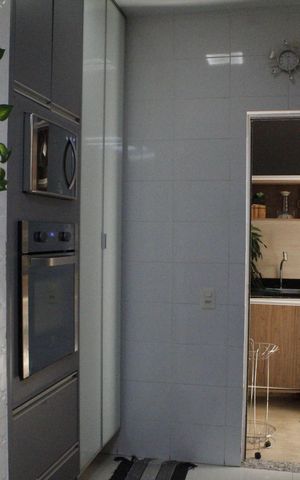 Casa de condomínio para alugar com 117m², 4 quartos e 2 vagasCozinha
