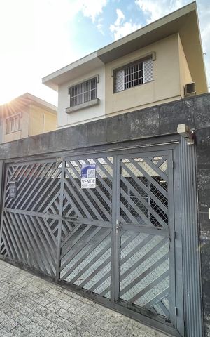 Casa à venda com 135m², 3 quartos e 3 vagas Casa à venda com 135m², 3 quartos e 3 vagasFachada com plaquinha