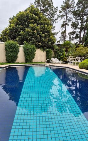 Casa de condomínio à venda com 870m², 5 quartos e 8 vagas Casa de condomínio à venda com 870m², 5 quartos e 8 vagasÁrea externa
