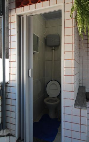 Casa de condomínio à venda com 125m², 2 quartos e 1 vagaBanheiro de Serviço