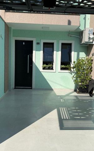 Casa à venda com 64m², 2 quartos e 1 vaga Casa à venda com 64m², 2 quartos e 1 vagaGaragem