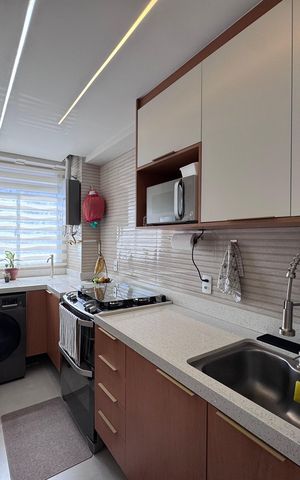 Apartamento à venda com 50m², 2 quartos e 1 vaga Apartamento à venda com 50m², 2 quartos e 1 vagaCozinha e Área de Serviço