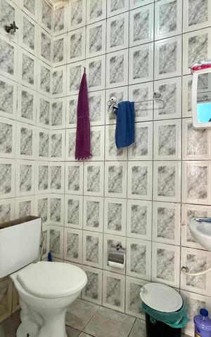 Casa à venda com 110m², 4 quartos e 2 vagas Casa à venda com 110m², 4 quartos e 2 vagasBanheiro 1