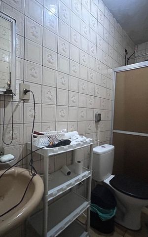 Casa à venda com 225m², 4 quartos e 3 vagasBanheiro de serviço 