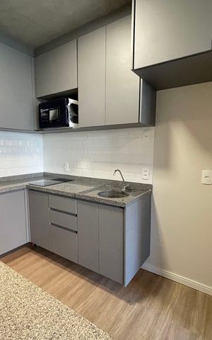 Studio à venda com 28m², 1 quarto e sem vaga Studio à venda com 28m², 1 quarto e sem vagaStudio - Cozinha