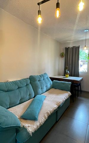 Casa de condomínio à venda com 105m², 2 quartos e 2 vagasSala