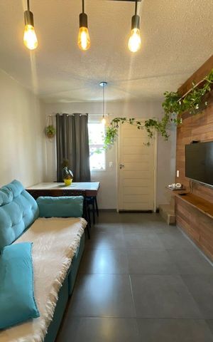 Casa de condomínio à venda com 105m², 2 quartos e 2 vagasSala