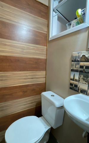 Casa de condomínio à venda com 105m², 2 quartos e 2 vagasBanheiro social