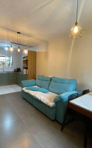 Casa de condomínio à venda com 105m², 2 quartos e 2 vagasSala