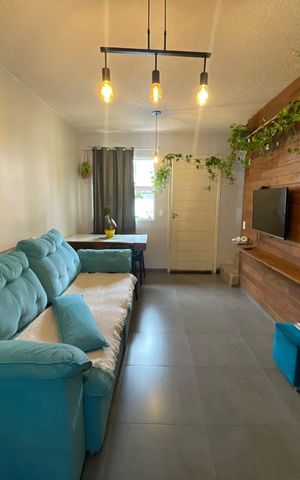 Casa de condomínio à venda com 105m², 2 quartos e 2 vagasSala