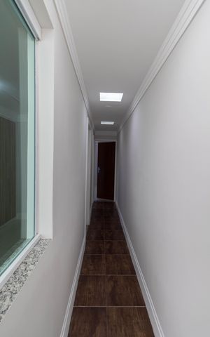 Casa à venda com 185m², 3 quartos e 4 vagas Casa à venda com 185m², 3 quartos e 4 vagasCorredor