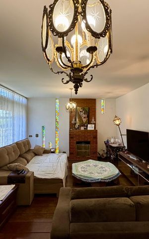 Casa à venda com 279m², 4 quartos e 3 vagasSala