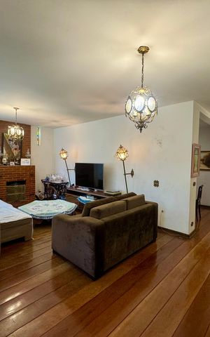 Casa à venda com 279m², 4 quartos e 3 vagasSala