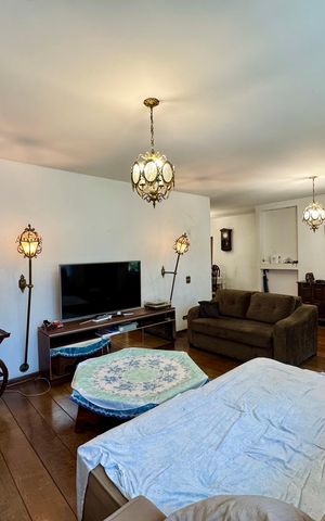 Casa à venda com 279m², 4 quartos e 3 vagasSala