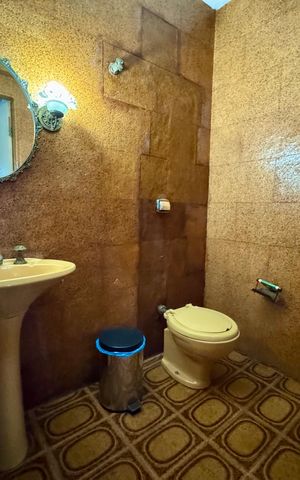 Casa à venda com 279m², 4 quartos e 3 vagasBanheiro 2