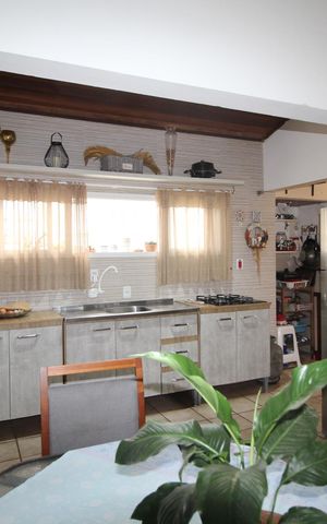 Casa à venda com 100m², 2 quartos e 3 vagasSala/Cozinha