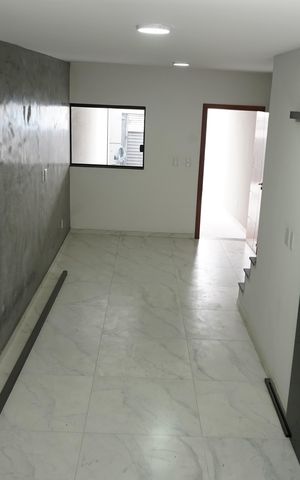 Casa à venda com 105m², 3 quartos e 2 vagasSala