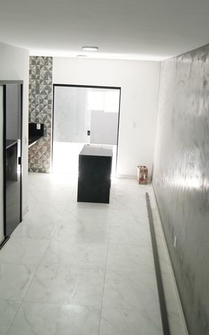Casa à venda com 105m², 3 quartos e 2 vagasSala