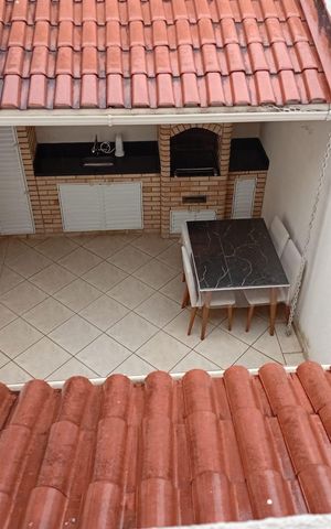 Casa à venda com 100m², 2 quartos e 2 vagas Casa à venda com 100m², 2 quartos e 2 vagasÁrea externa