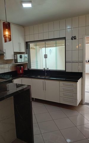 Casa à venda com 100m², 2 quartos e 2 vagas Casa à venda com 100m², 2 quartos e 2 vagasCozinha