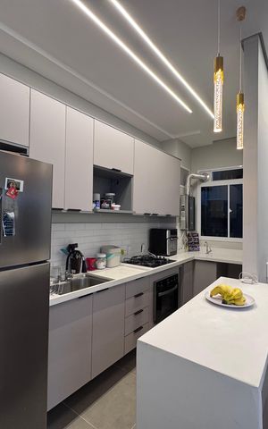 Apartamento à venda com 66m², 2 quartos e 1 vaga Apartamento à venda com 66m², 2 quartos e 1 vagaCozinha e Área de Serviço