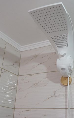 Casa à venda com 110m², 3 quartos e 2 vagasBanheiro da Suíte
