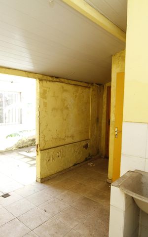 Casa à venda com 200m², 4 quartos e 1 vagaÁrea de Serviço