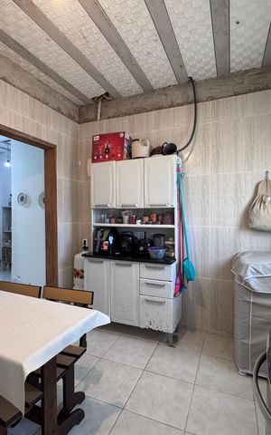 Casa de condomínio à venda com 77m², 2 quartos e sem vaga Casa de condomínio à venda com 77m², 2 quartos e sem vagaCozinha