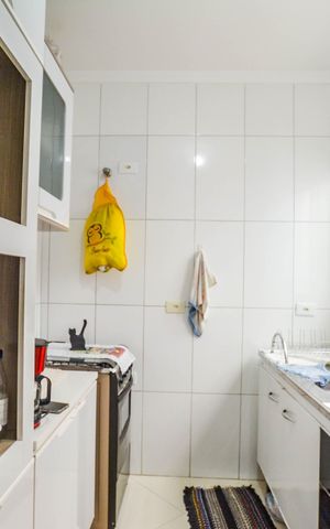 Casa à venda com 89m², 2 quartos e 2 vagas Casa à venda com 89m², 2 quartos e 2 vagasCozinha