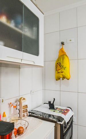 Casa à venda com 89m², 2 quartos e 2 vagas Casa à venda com 89m², 2 quartos e 2 vagasCozinha