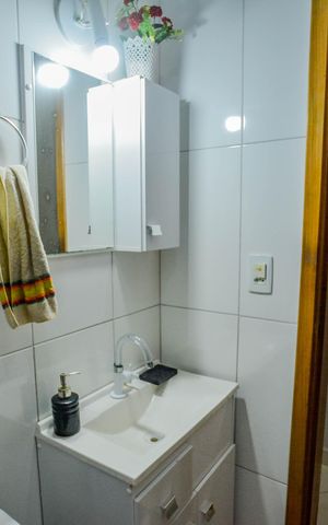 Casa à venda com 89m², 2 quartos e 2 vagas Casa à venda com 89m², 2 quartos e 2 vagasBanheiro Corredor