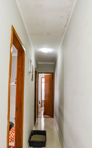 Casa à venda com 89m², 2 quartos e 2 vagas Casa à venda com 89m², 2 quartos e 2 vagasCorredor