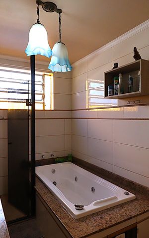 Casa à venda com 640m², 4 quartos e 3 vagasBanheiro da Suíte