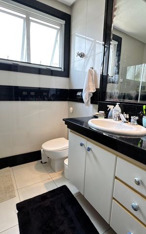 Casa de condomínio à venda com 450m², 4 quartos e 4 vagas Casa de condomínio à venda com 450m², 4 quartos e 4 vagasBanheiro 2 Suite