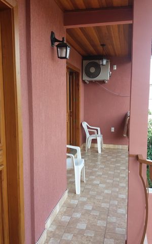 Casa à venda com 201m², 4 quartos e 2 vagas Casa à venda com 201m², 4 quartos e 2 vagasÁrea externa