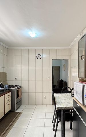 Casa à venda com 117m², 3 quartos e 2 vagas Casa à venda com 117m², 3 quartos e 2 vagasCozinha