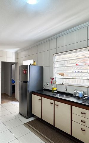 Casa à venda com 117m², 3 quartos e 2 vagas Casa à venda com 117m², 3 quartos e 2 vagasCozinha