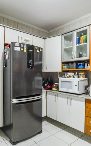 Casa à venda com 84m², 2 quartos e 2 vagas Casa à venda com 84m², 2 quartos e 2 vagasCozinha