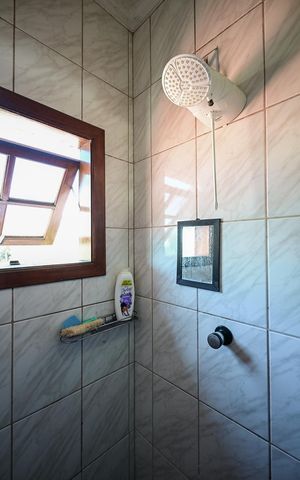 Casa para alugar com 101m², 3 quartos e 2 vagasChuveiro do Banheiro 