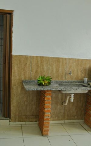 Casa à venda com 300m², 3 quartos e 4 vagasÁrea de convivência/Churrasco 