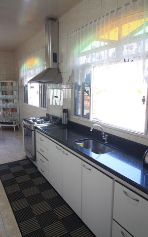 Casa à venda com 637m², 3 quartos e 1 vagaCozinha e Área de Serviço