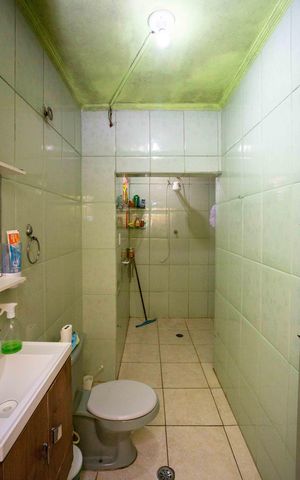 Casa à venda com 125m², 3 quartos e 1 vagaBanheiro Casa 1