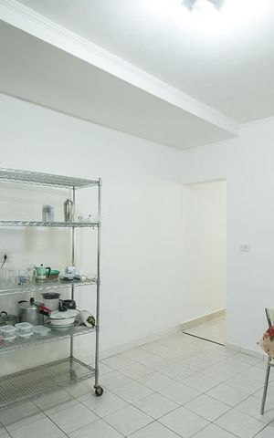 Casa à venda com 120m², 4 quartos e 2 vagas Casa à venda com 120m², 4 quartos e 2 vagasCozinha