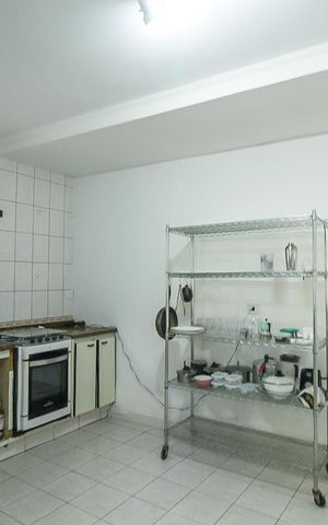 Casa à venda com 120m², 4 quartos e 2 vagas Casa à venda com 120m², 4 quartos e 2 vagasCozinha