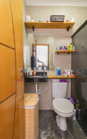 Casa à venda com 115m², 2 quartos e 3 vagasBanheiro da Suíte 2