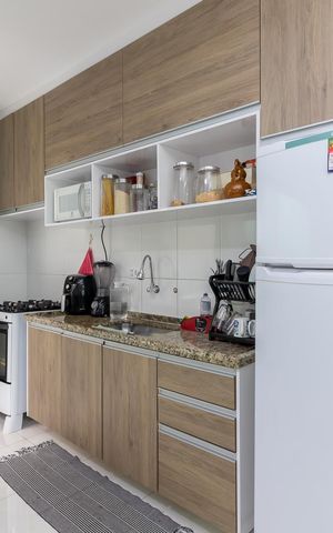 Casa de condomínio à venda com 67m², 2 quartos e 1 vagaSala de Jantar e Cozinha