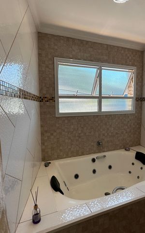 Casa à venda com 342m², 3 quartos e 4 vagas Casa à venda com 342m², 3 quartos e 4 vagasBanheiro da Suíte 3