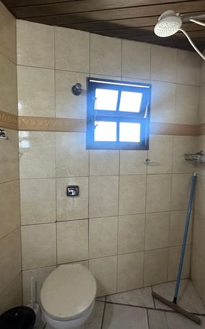 Casa à venda com 342m², 3 quartos e 4 vagas Casa à venda com 342m², 3 quartos e 4 vagasBanheiro da Suíte 1