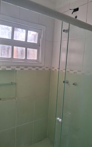 Casa à venda com 200m², 4 quartos e 2 vagas Casa à venda com 200m², 4 quartos e 2 vagasBanheiro